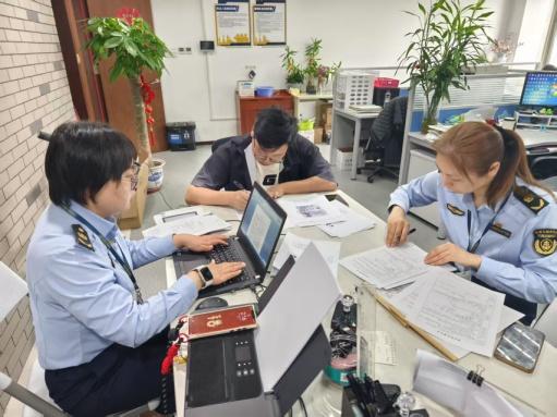 区交通委执法大队约谈违法网约车平台1.jpeg